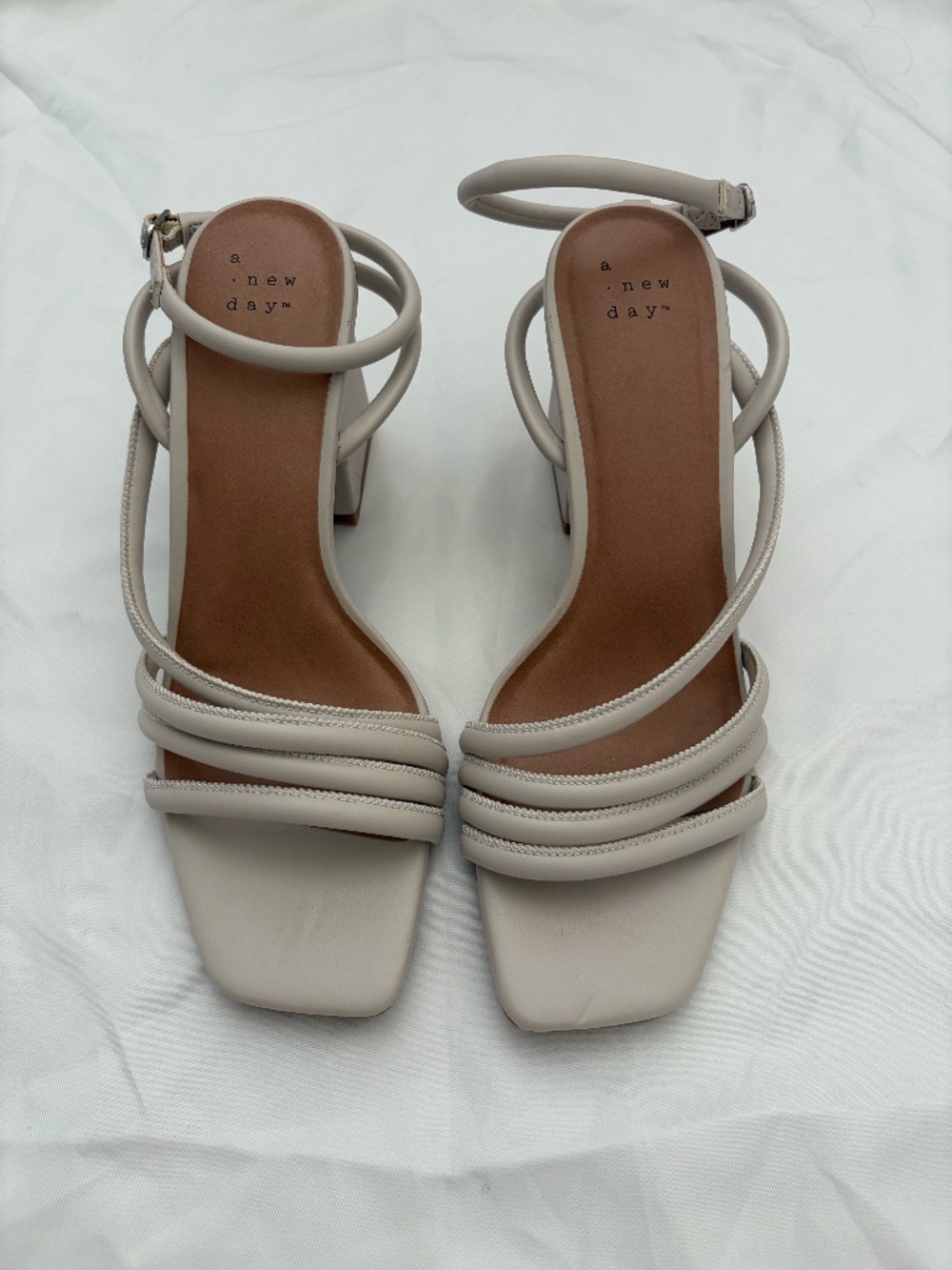 A new day tan heel